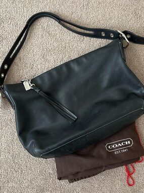 Coach Black Leather Messenger Bag with Tassel